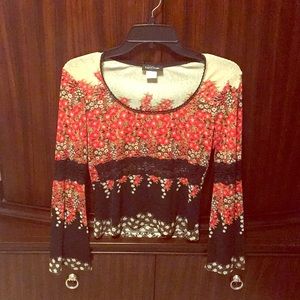 Red floral Shirt with lace detail.